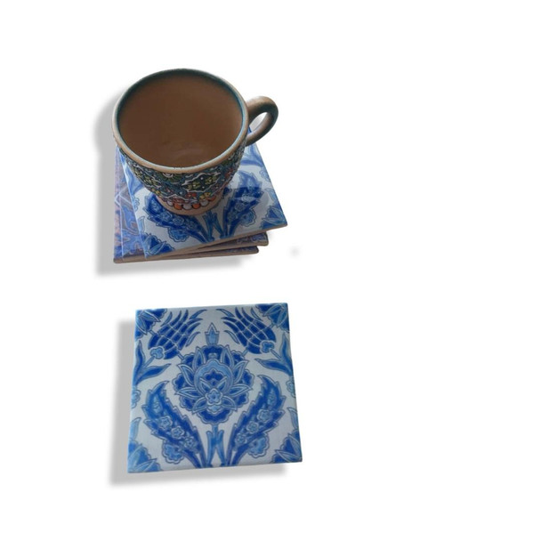 A premium Craftihouse set of four ceramic coasters, designed to provide both functional table protection and sophisticated, cultural elegance.