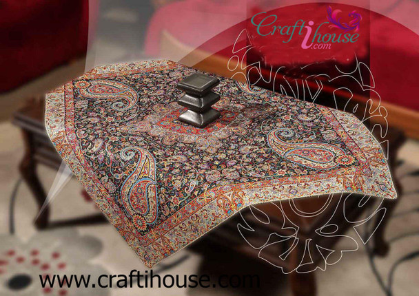 A luxury golden-toned Persian Termeh tablecloth with intricate paisley silk weaving