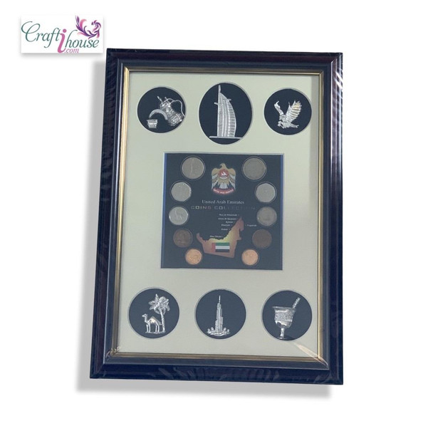 Front exhibition view of a premium 35x25 cm 7 Emirates natural sand art frame, showcasing detailed layers of authentic regional sands arranged in a stunning traditional landscape layout.