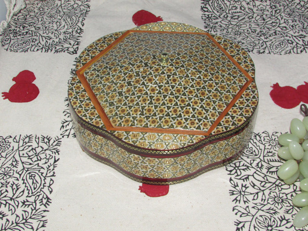 A premium handmade Khatam-Kari trinket box titled "The Mosaic Keepsake" featuring intricate geometric wood inlay patterns and a lid.