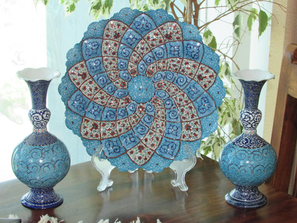 A premium 3-piece handmade copper set featuring a large engraved wall hanging plate and two matching decorative vases.
