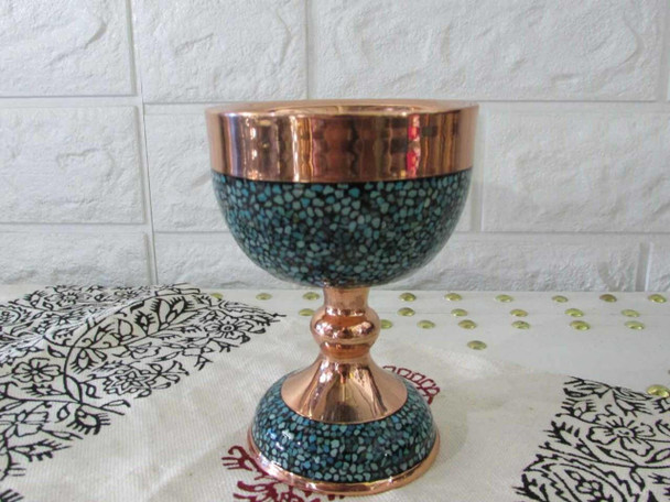 Close-up of the fluted, scalloped edges of the copper bowl showing the precise placement of turquoise stones