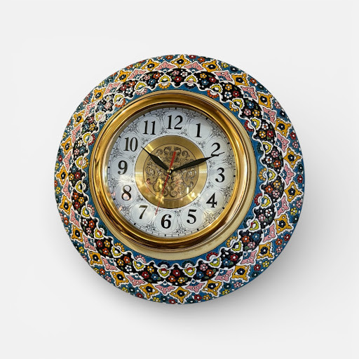 Front view of the 40 cm Chahar Bagh ceramic wall clock featuring multi-colored embossed Persian patterns.