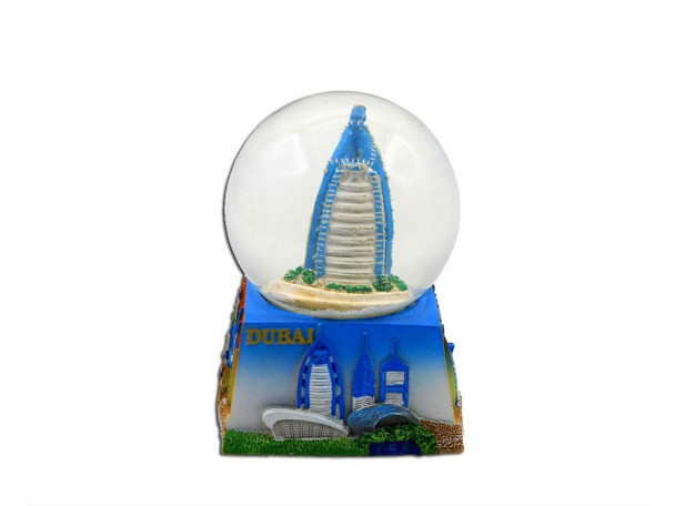 A professional product presentation of the exclusive Burj Al Arab snow globe from a premier UAE shop.