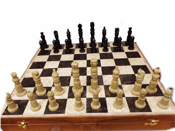 A premium handcrafted stone chess set on a 42x42 cm board with beautifully carved pieces.
