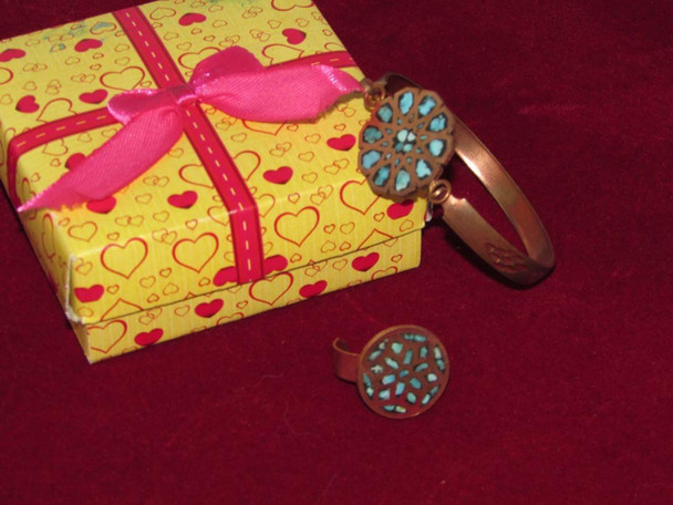 Handmade copper wearable art featuring authentic sky-blue turquoise inlay details from the Craftihouse collection.