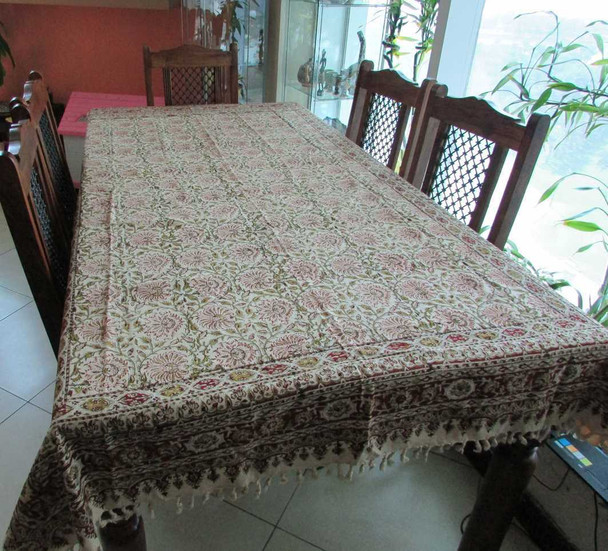 A view of the intricate floral border of the tapestry, highlighting the precision of the hand-carved wooden block stamps.