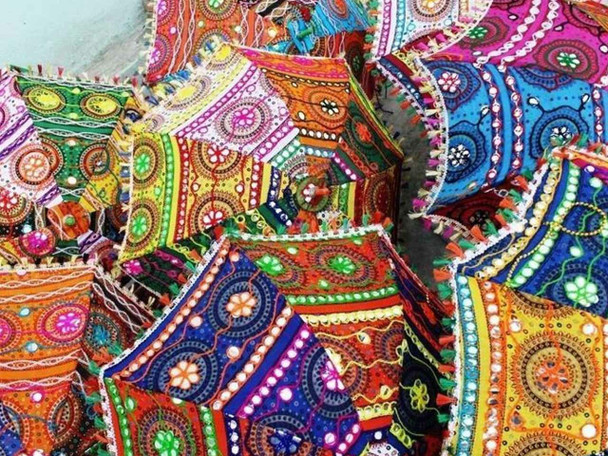 A vibrant 5-piece collection of assorted traditional patterned umbrellas