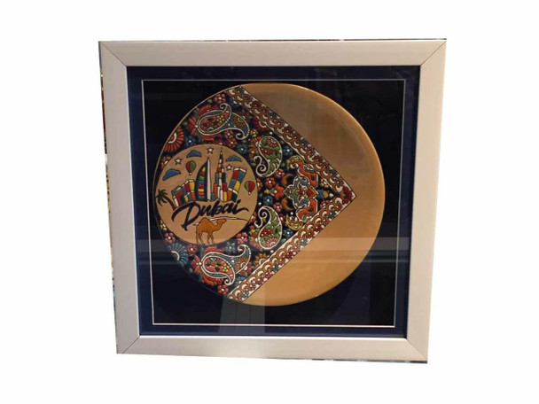 A masterfully crafted 25 cm framed hand-painted plate,