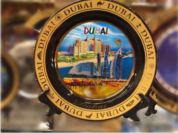 A stunning 6-inch Atlantis The Palm Dubai souvenir plate featuring a brilliant 24K gold plated finish, suitable for luxury wall and table decor.
