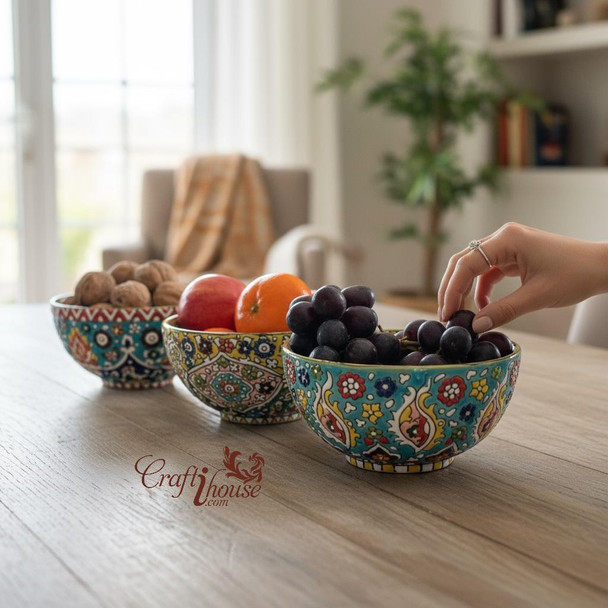 A professional lifestyle presentation shot of the 15cm decorative pottery bowl displaying its colorful palette and distinct cultural character.
