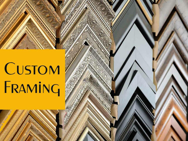 Professional consultation for selecting the perfect custom frame for your cherished pieces.