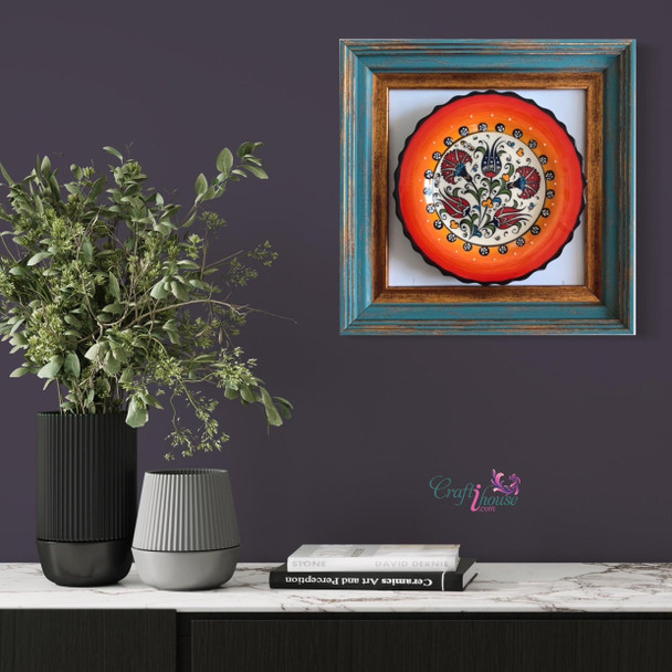 A stunning 18 cm handmade Turkish ceramic plate with floral patterns set in a premium 29x29 cm gallery frame for wall decor.
