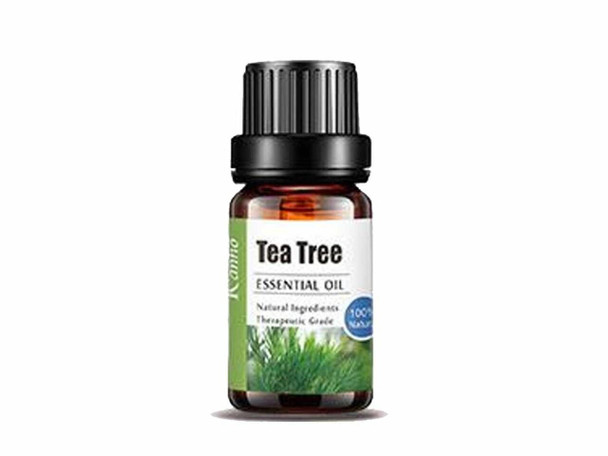 A brown glass bottle of Tea Tree Essential Oil featuring a clean white and green label with botanical leaf graphics and a black cap.