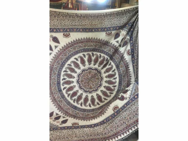 A professional product presentation of the decorative artisan Ghalamkari textile from a premier art, gift, and home decor supplier.