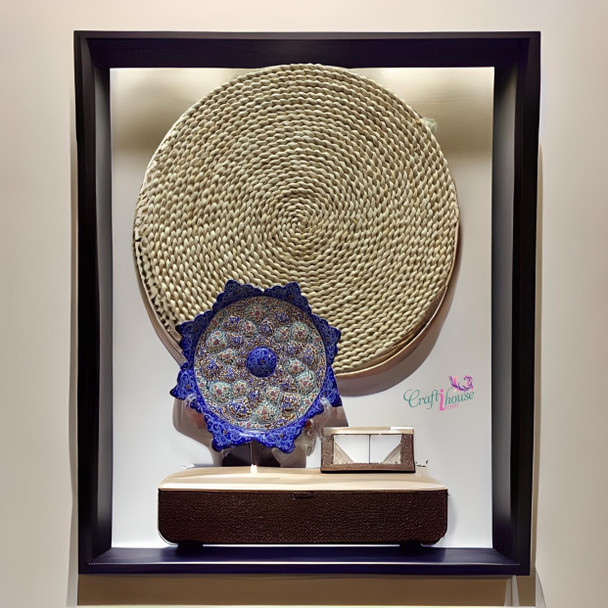 A premium 16 cm handmade Minakari copper plate featuring vibrant hand-painted blue enamel patterns and a scratch-proof high-gloss finish.