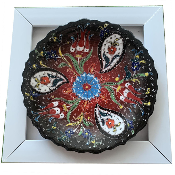 A stunning 18 cm handmade embossed ceramic plate with vibrant folk art patterns set in a premium 22x22 cm gallery frame for wall decor.