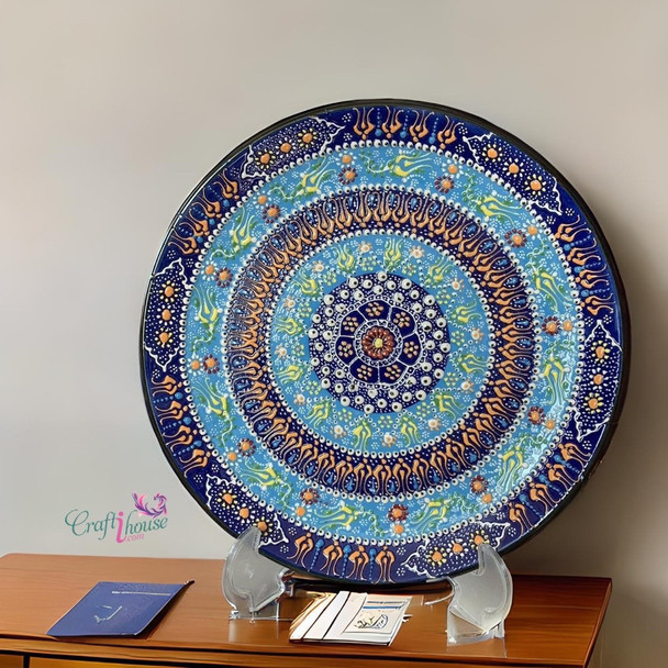A professional product shot of the 30 cm assorted pattern plate styled as an elegant interior wall accent.
