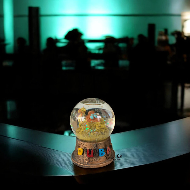 Luxury Camel Snow Globe Premium Design Showcase