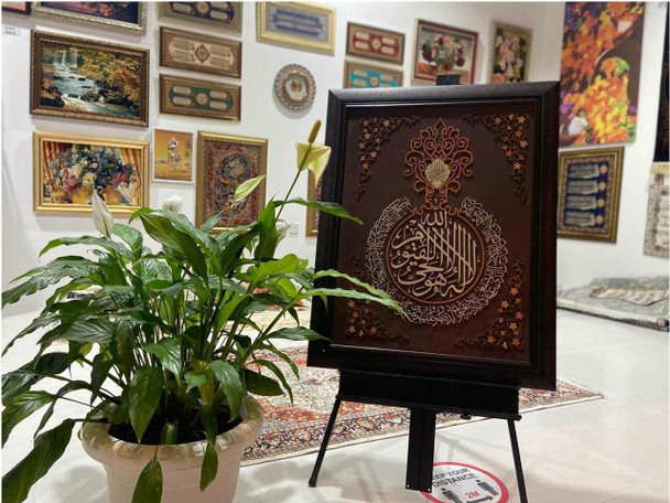 A professional product presentation of the luxury 80x60 cm Ayat Al Kursi wooden wall decor from a premier UAE art and gift shop.