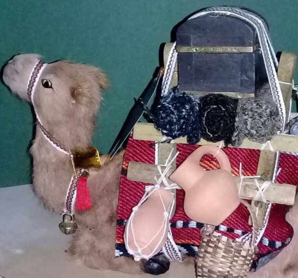 A professional product presentation of the exclusive handmade desert camel souvenir from a premier UAE shop.