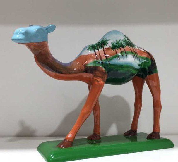 Stunning hand painted ceramic camel with stand