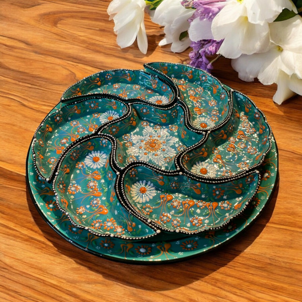 A vibrant hand-painted Turkish ceramic meze set featuring intricate floral patterns and a circular serving tray