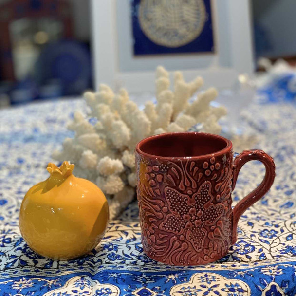 A premium large handmade Turkish ceramic coffee mug featuring vibrant red hand-painted relief floral patterns and a glossy finish.