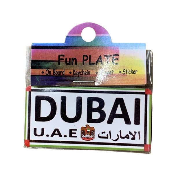 A durable aluminum souvenir magnet showcasing the iconic Dubai name and U.A.E. emblem.