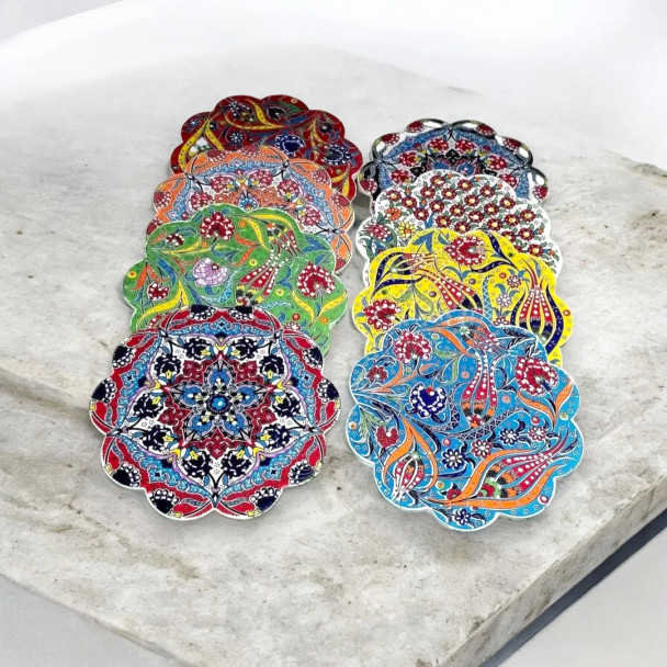 Handcrafted Turkish ceramic coasters arranged to show the diversity of patterns and colors in the collection.