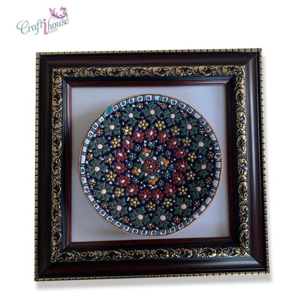 A professional product presentation of the 16 cm framed embossed ceramic plate against a clean background.