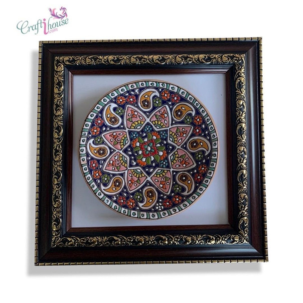 A professional product presentation of the 16 cm framed embossed pottery plate against a clean background.