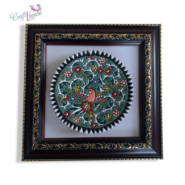 A professional product presentation of the 16 cm framed hand-painted ceramic wall plaque against a neutral background.
