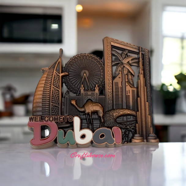 A professional product presentation of the decorative Dubai souvenir magnet from a premier UAE gift shop.il