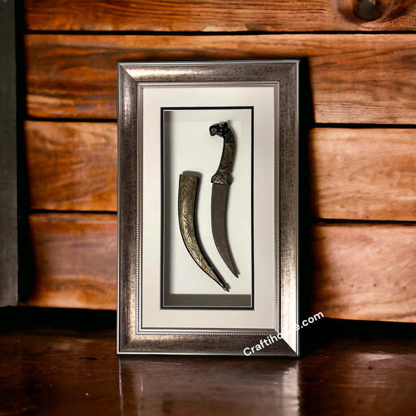 The elite handmade tiger head dagger artwork presented as a luxury VIP souvenir option within a high-end corporate showroom layout in Dubai.