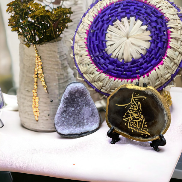 Exquisite hand-painted Islamic calligraphy of "Hasbunallah wa Ni'mal Wakil" on a gold-edged sliced agate stone.