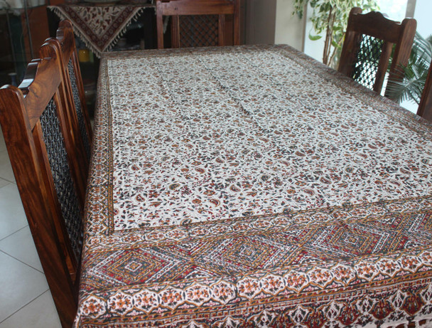 A premium 190x135 cm handmade Ghalamkari cotton cloth titled "The Indigo Vineyard" featuring intricate indigo and ivory block-printed floral patterns.