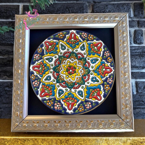 Vibrant mandala-style circular wall art with orange, green, and blue patterns, perfect for boho home decor.