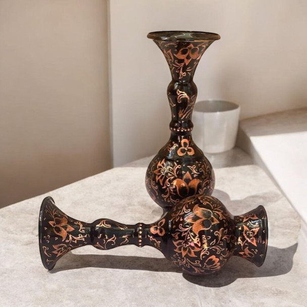 A set of 2 handcrafted 16 cm solid copper vases featuring hand-engraved bird and floral patterns on a dark-weathered finish.