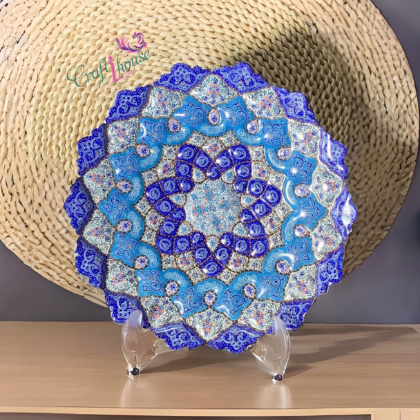 A stunning 30 cm hand-enamelled and embossed copper plate, showcasing exquisite painting and artisan wall decor.