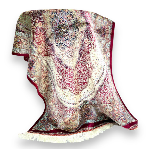 A premium 150x100 cm machine-made silk carpet titled "The Silk Oasis" featuring a shimmering blue and gold Persian medallion design.