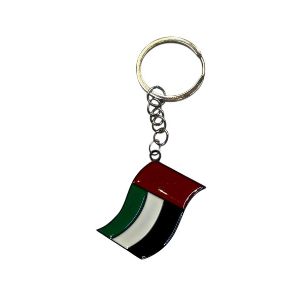 Metal keychain featuring the UAE national flag in red, green, white, and black enamel