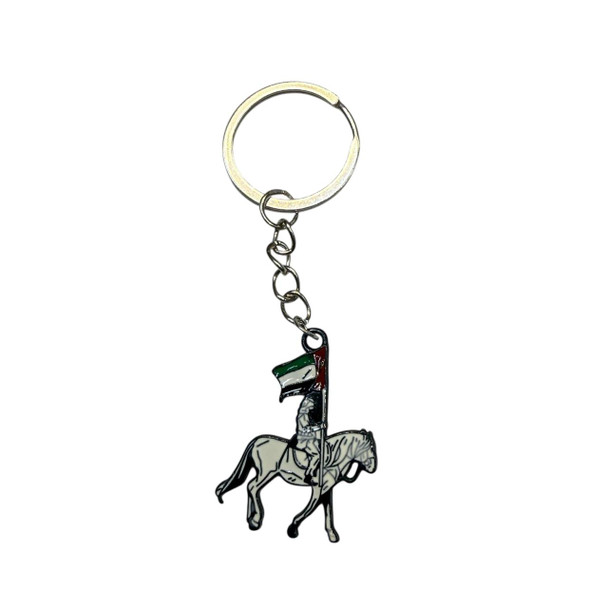 A premium enamel keychain featuring a rider on a white Arabian horse carrying the United Arab Emirates flag.