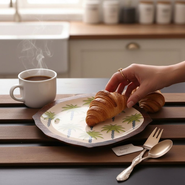 A 36x30 cm handcrafted mango wood tray carved into a palm tree silhouette with an ivory interior and tropical motifs.