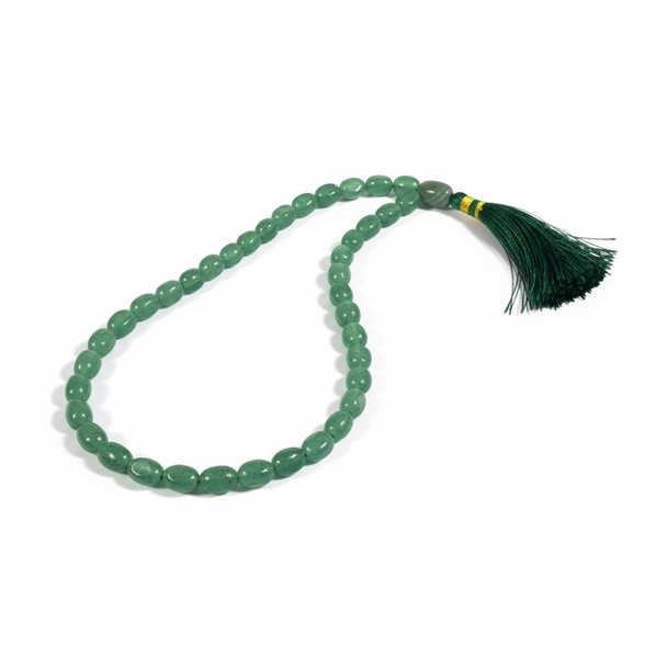 A 33-bead prayer tasbih made from polished natural stones with a traditional decorative tassel on a neutral background.
