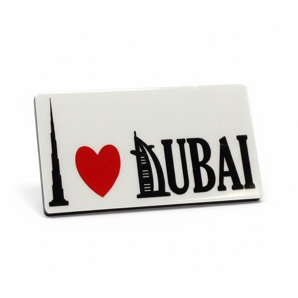 A 6.5x3.5 cm customized aluminum fridge magnet featuring a vibrant print of the Burj Khalifa and Dubai skyline