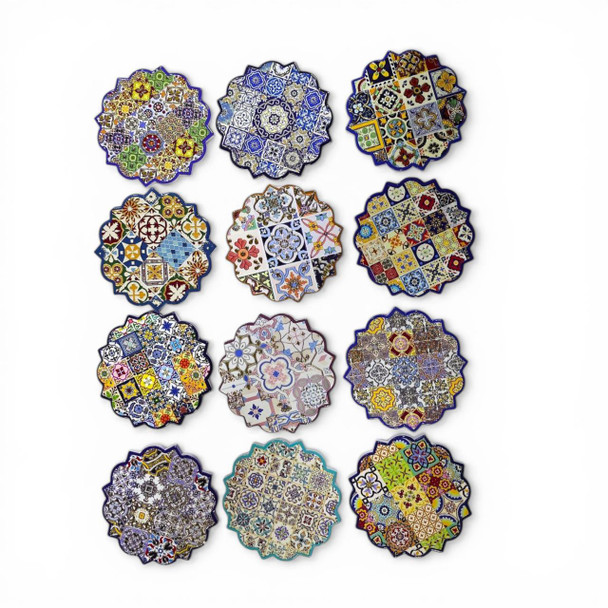 A single 10 cm ceramic tea coaster featuring a vibrant, multi-colored geometric mandala pattern.