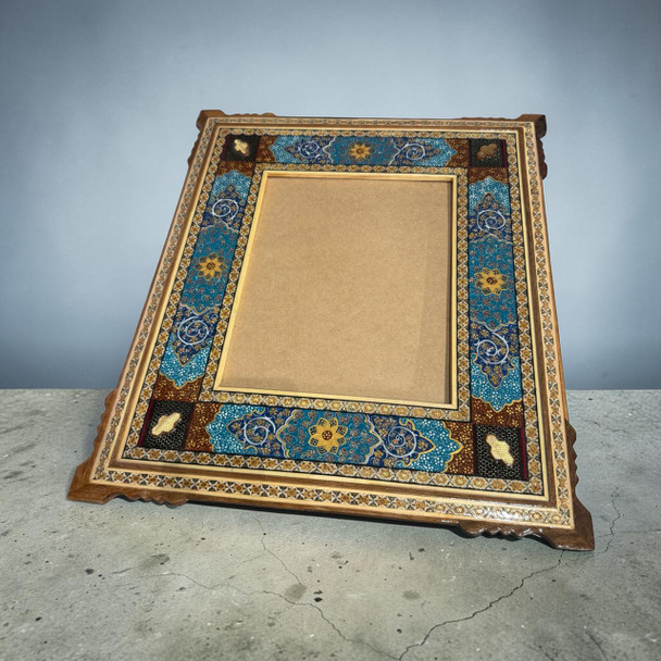 A luxury 51x45 cm handmade Khatamkari inlaid wooden frame featuring vibrant hand-painted Tezhib illumination on the inner border.