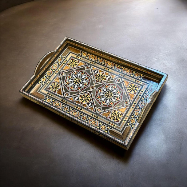 A 39x27 cm handmade wooden serving tray featuring an intricate geometric mosaic inlay pattern.