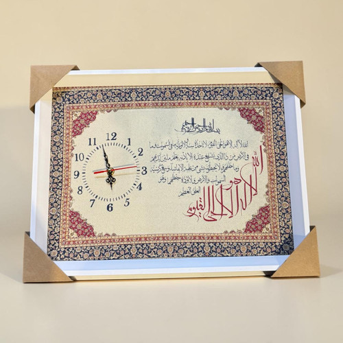 Premium 48x37 cm signature Ayat Al Kursi framed clock featuring elegant dial details over a woven silk fabric script backdrop.